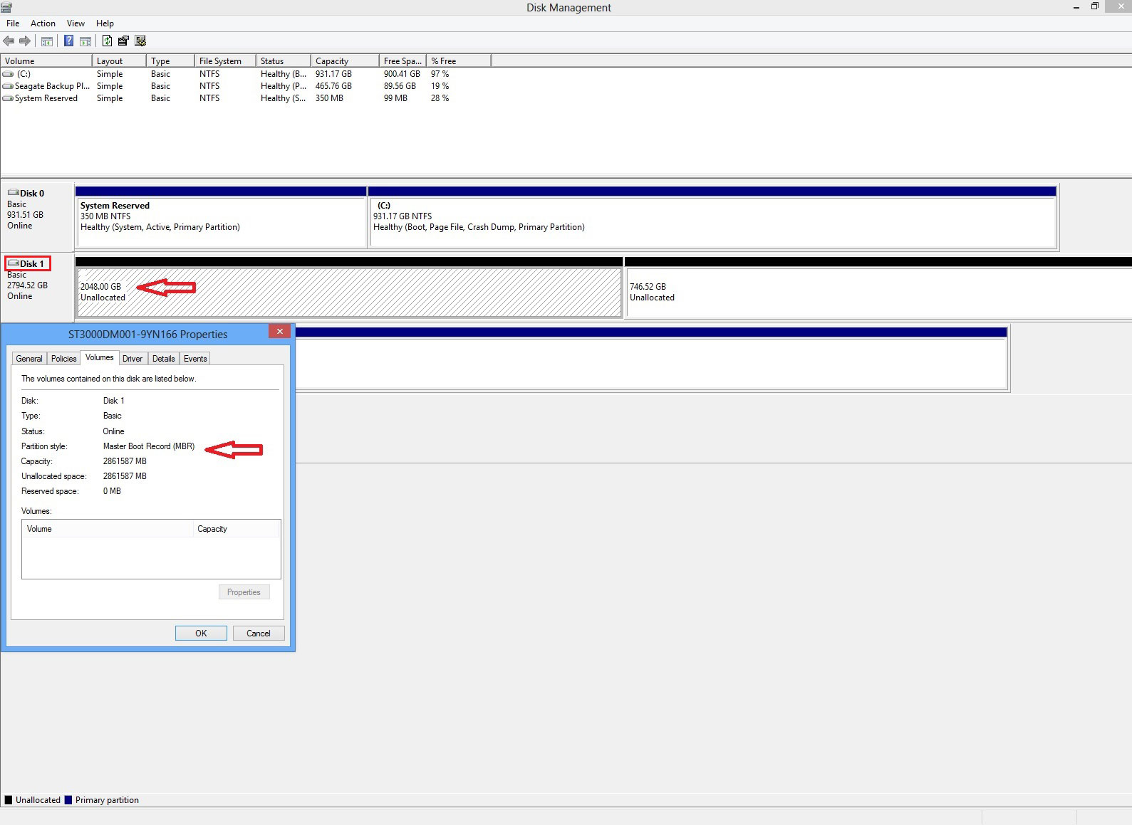 Shows disk management with a properties box open. Disk 1 is squared off and there is an arrow pointing to 